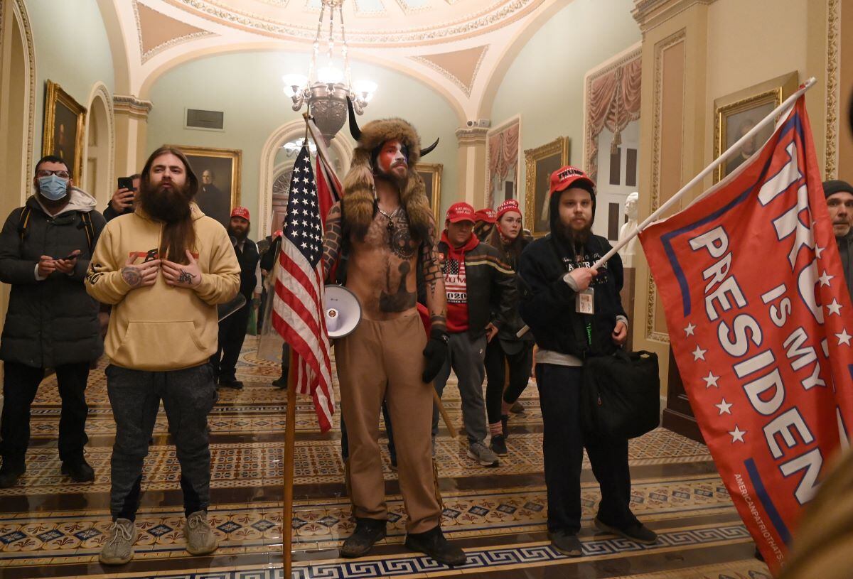 In this file photo taken on January 6, 2021, supporters of US President Donald Trump enter the US Capitol.  (SAUL LOEB / AFP).