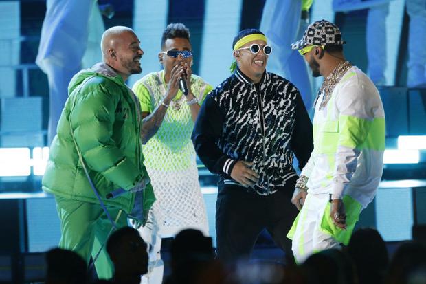 From left to right J Balvin, Ozuna, Daddy Yankee and Anuel AA sing together during the 2019 Billboard Latin Music Awards. (Photo: Eric Jamison/Invision/AP)