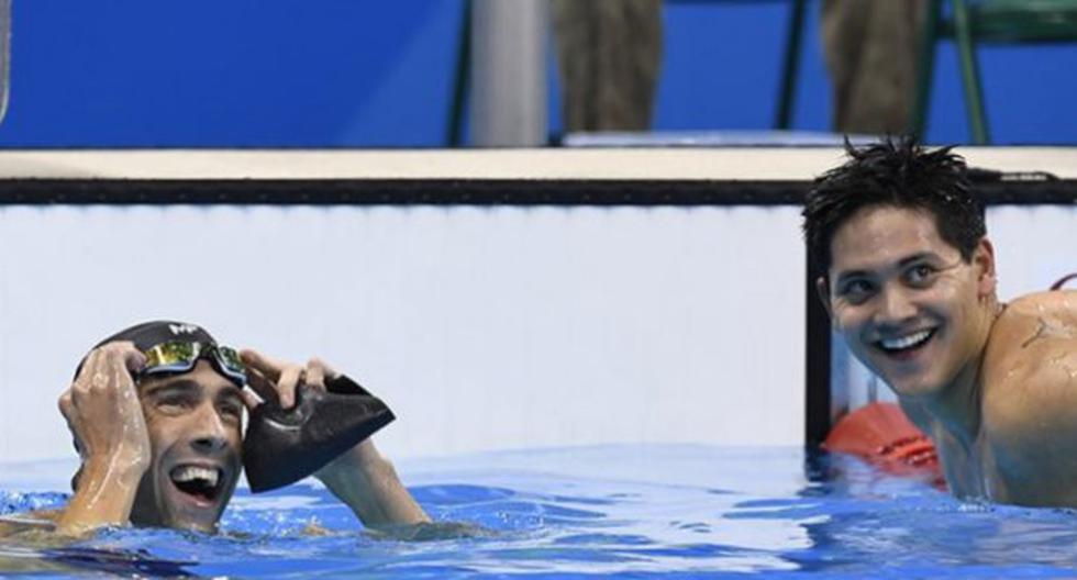 Michael Phelps y Joseph Schooling en la final de natación. (Foto: AFP)