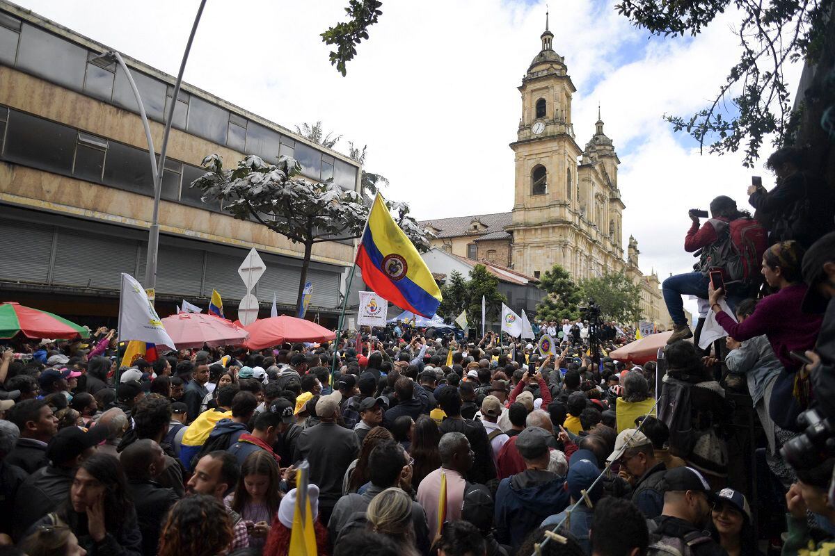 Supporters of Colombian President Gustavo Petro listen to his speech during a demonstration in support of his social reforms in Bogotá on June 7, 2023. (Photo by Raul ARBOLEDA / AFP)