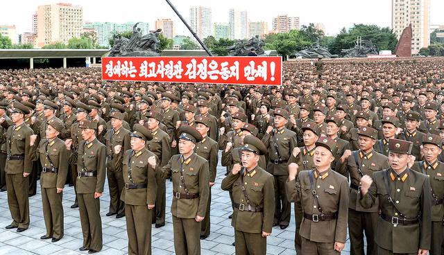 This picture taken on August 10, 2017 and released by North Korea's official Korean Central News Agency (KCNA) on August 11, 2017 shows service personnel of the Ministry of People's Armed Forces at a rally in support of North Korea's stance against the US, at the fatherland liberation war victory monument and education square in Pyongyang.   - South Korea OUT / REPUBLIC OF KOREA OUT   ---EDITORS NOTE--- RESTRICTED TO EDITORIAL USE - MANDATORY CREDIT "AFP PHOTO/KCNA VIA KNS" - NO MARKETING NO ADVERTISING CAMPAIGNS - DISTRIBUTED AS A SERVICE TO CLIENTS
THIS PICTURE WAS MADE AVAILABLE BY A THIRD PARTY. AFP CAN NOT INDEPENDENTLY VERIFY THE AUTHENTICITY, LOCATION, DATE AND CONTENT OF THIS IMAGE. THIS PHOTO IS DISTRIBUTED EXACTLY AS RECEIVED BY AFP. 


 / AFP / KCNA VIA KNS / STR / REPUBLIC OF KOREA OUT   ---EDITORS NOTE--- RESTRICTED TO EDITORIAL USE - MANDATORY CREDIT "AFP PHOTO/KCNA VIA KNS" - NO MARKETING NO ADVERTISING CAMPAIGNS - DISTRIBUTED AS A SERVICE TO CLIENTS
THIS PICTURE WAS MADE AVAILABLE BY A THIRD PARTY. AFP CAN NOT INDEPENDENTLY VERIFY THE AUTHENTICITY, LOCATION, DATE AND CONTENT OF THIS IMAGE. THIS PHOTO IS DISTRIBUTED EXACTLY AS RECEIVED BY AFP.