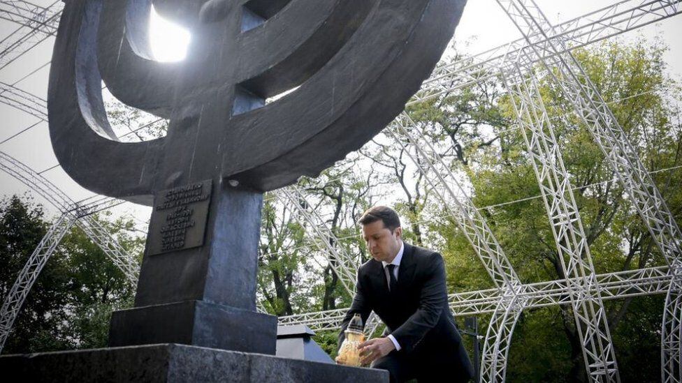 President Zelensky is Jewish.  In the photo he is seen in the Babi Yar Menorah.  (GETTY IMAGES).