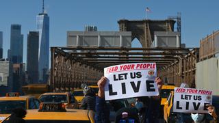 Coronavirus: Taxistas de Nueva York cortan el puente de Brooklyn para pedir auxilio | FOTOS