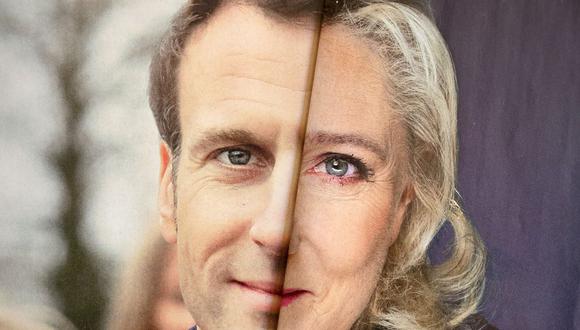 Esta fotografía tomada el 6 de abril de 2022 en Marsella, en el sur de Francia, muestra propaganda electoral pegada de Emmanuel Macron y de Marine Le Pen.
(Nicolás TUCAT / AFP).
