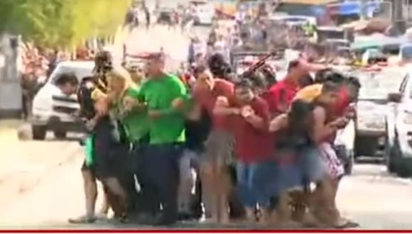 YouTube: Ladrones toman 12 rehenes y los usan como escudos humanos en Manaos, Brasil.