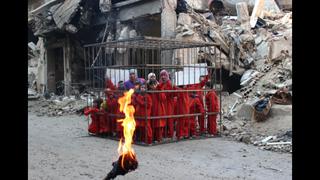 Siria: Opositores difunden fotos inspiradas en Estado Islámico