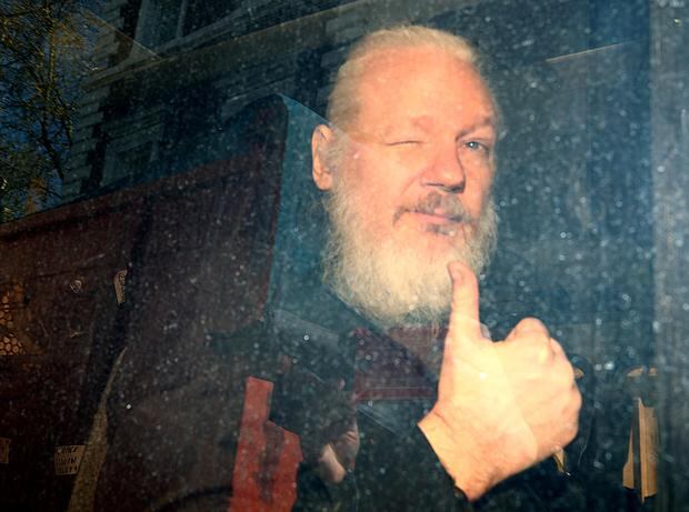 Assange, with a long beard, arrives at Westminster court on April 11, 2019. REUTERS / Hannah McKay / File Photo