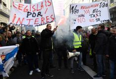 Taxistas bloquean calles de Madrid y Barcelona en protestas contra Uber | FOTOS