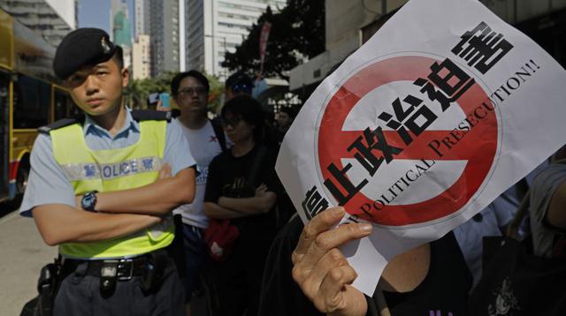 Wong y Chow fueron previamente declarados culpables de asamblea ilegal y Law de incitar a otros a una reunión ilícita. (Foto: AFP)
