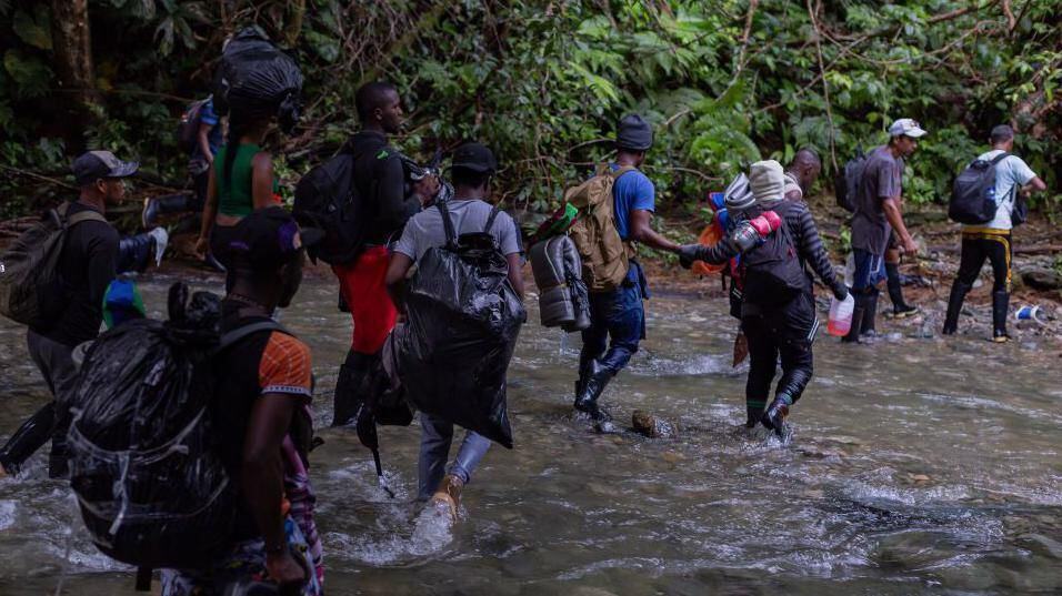 Migrants crossing the dangerous Darien jungle cross rivers and face threats from armed groups.  (GET IMAGES).