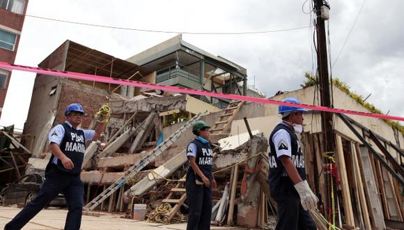 El hallazgo en el colegio Rébsamen incrementó a 26 el número de víctimas mortales por el derrumbe. Además se rescataron con vida 11 niños. (Foto: AFP)