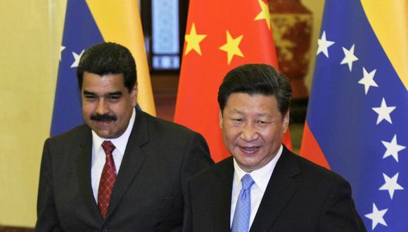 El presidente chino, Xi Jinping (d), y su homólogo venezolano, Nicolás Maduro. (Foto: EFE)