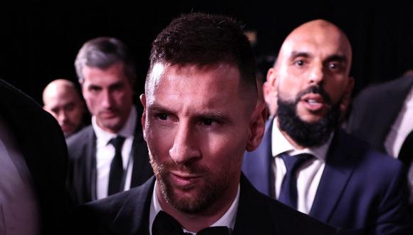 Inter Miami CF's Argentine forward Lionel Messi (C) reacts as he leaves the 2023 Ballon d'Or France Football award ceremony at the Theatre du Chatelet in Paris on October 30, 2023. Lionel Messi won the men's Ballon d'Or award for a record-extending eight time at a ceremony in Paris on October 30, 2023. (Photo by FRANCK FIFE / AFP)