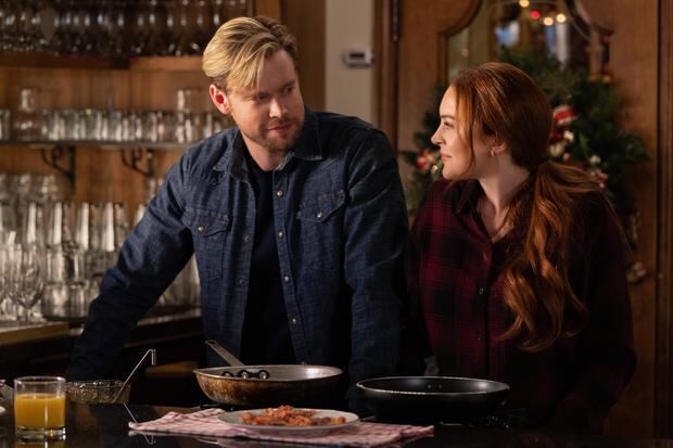 Chord Overstreet and Lindsay Lohan in "Christmas Hit".