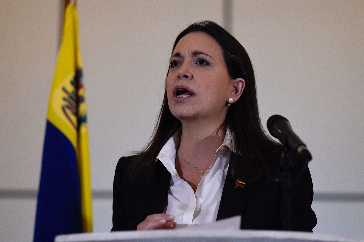 Former Venezuelan opposition congresswoman María Corina Machado gives a press conference in Caracas on June 29, 2018. (Photo by Federico PARRA / AFP)