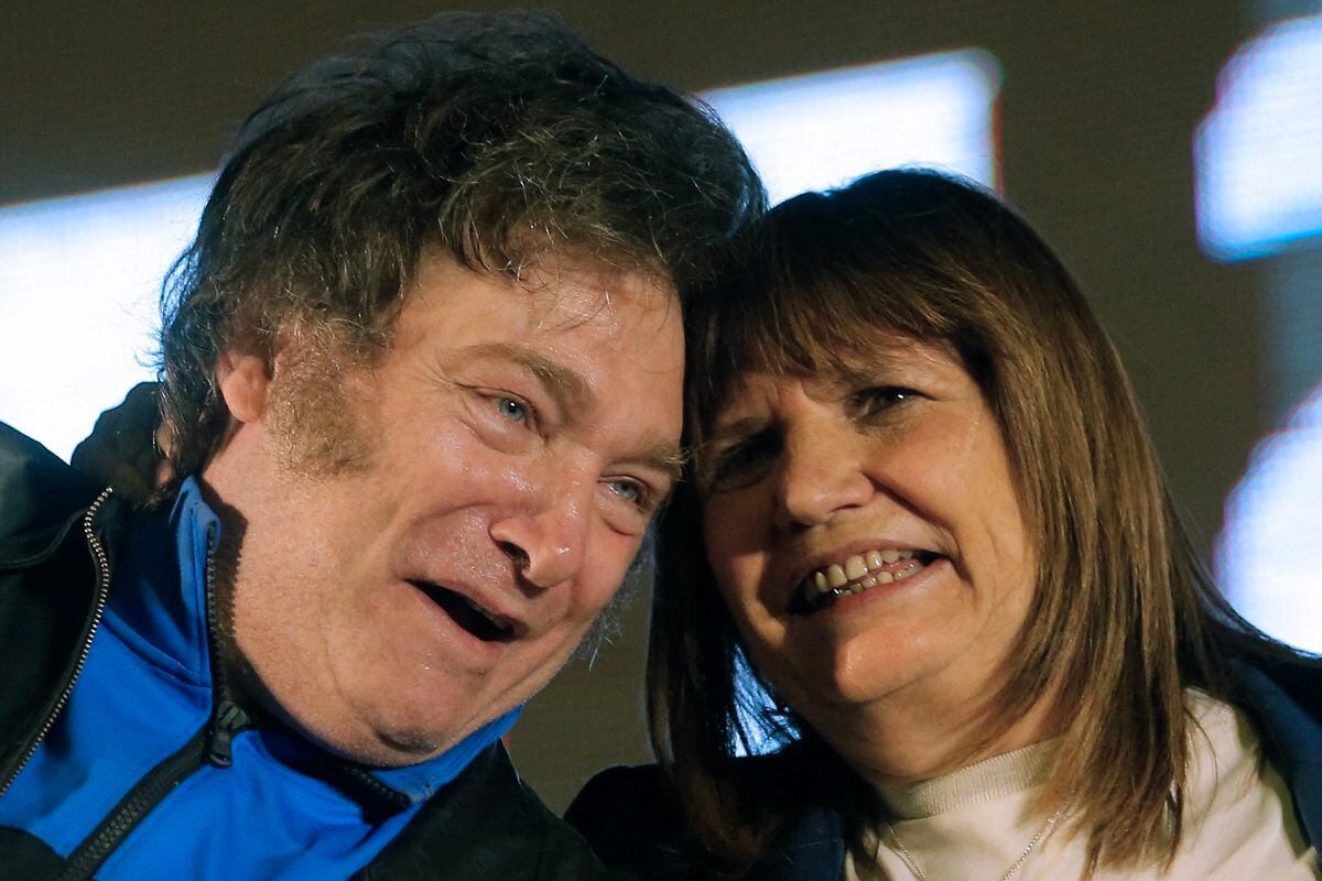 The president-elect of Argentina, Javier Milei, with former presidential candidate, Patricia Bullrich, during the end of his electoral campaign in Córdoba, Argentina, on November 16, 2023. (Photo by DIEGO LIMA / AFP)