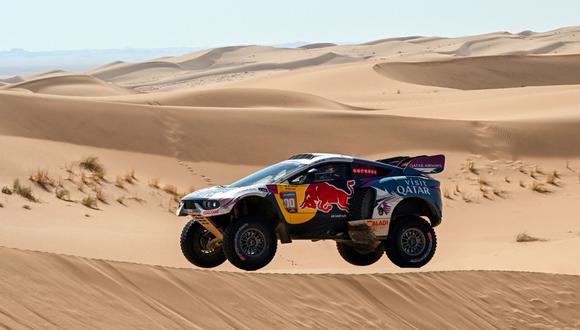 Nasser Racing's Qatari driver Nasser Al-Attiyah and his French co-driver Mathieu Baumel compete during Stage 3 of the Dakar Rally 2024, between Al Duwadimi and Al Salamiya, Saudi Arabia, on January 8, 2024. (Photo by PATRICK HERTZOG / AFP)