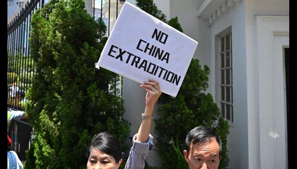 Activistas de Hong Kong se oponen a la aprobación de una ley de extradición a China. (AFP).
