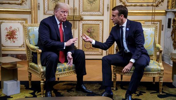 Donald Trump ataca a Emmanuel Macron por sus "bajos niveles de popularidad". (AFP).
