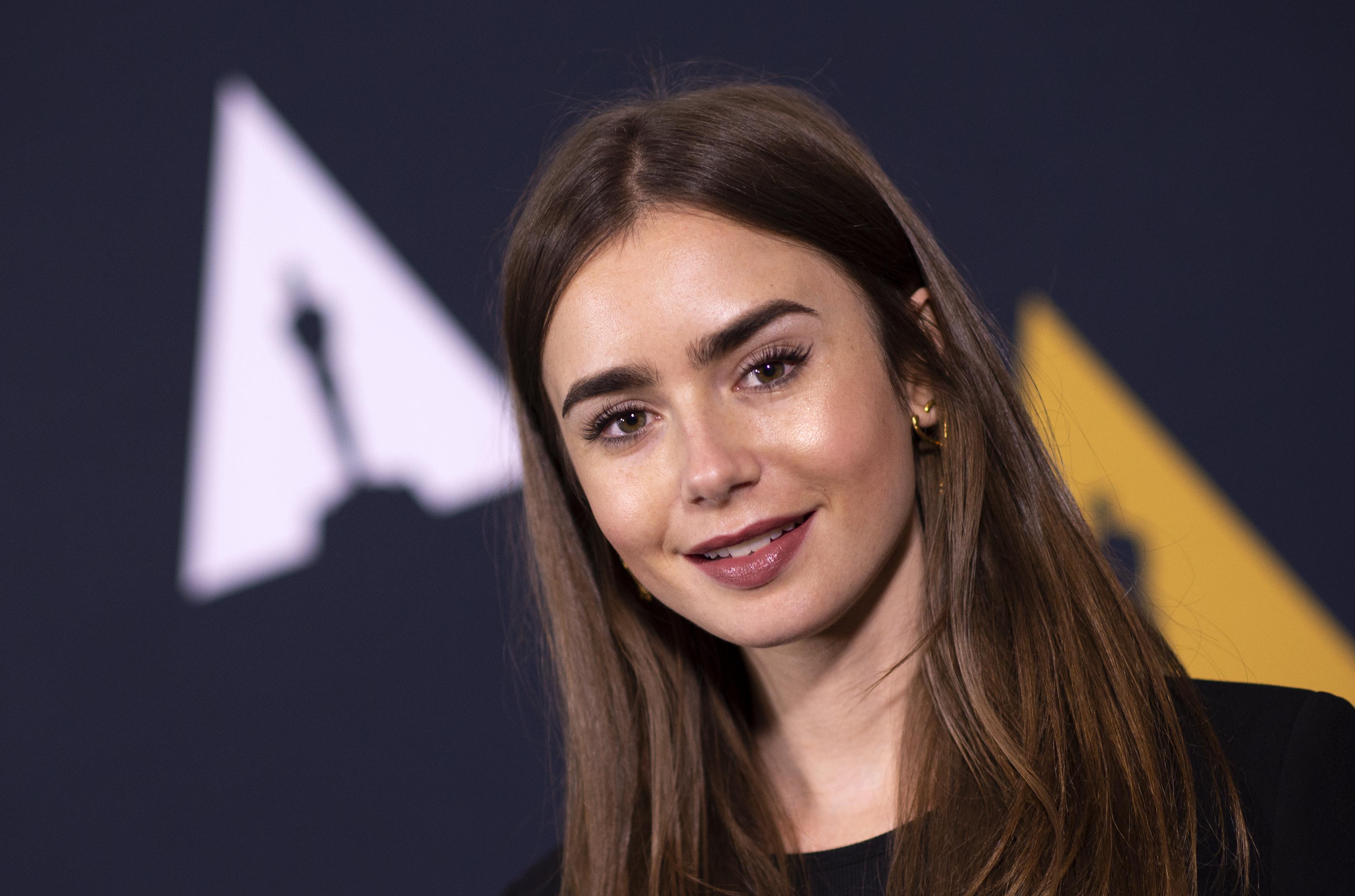 Lily Collins es la única hija del segundo matrimonio del cantante Phill Collins con Jill Tavelman. (Valerie Macon / AFP)