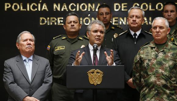 El ministro de Defensa Guillermo Botero (izquierda) junto al presidente Iván Duque (centro). (Foto: AFP).