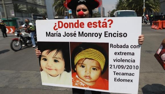 Acompañados de padres y familiares de personas desaparecidas, niños y adolescentes marcharon con pancartas para exigir justicia por menores desaparecidos en México. (EFE/Sáshenka Gutiérrez).