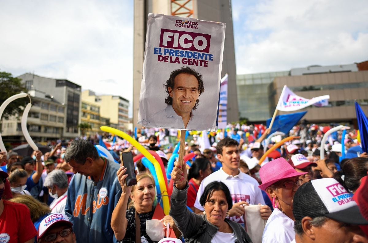 Supporters of Colombian presidential candidate for the Equipo Colombia coalition, Federico Gutiérrez, attend a campaign rally in Armenia, Colombia, on May 14, 2022. (Juan BARRETO / AFP)