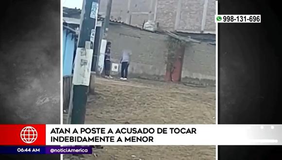 Padre golpea y ata a un poste al acusado de tocamientos indebidos a su hija. Foto: Captura América Noticias