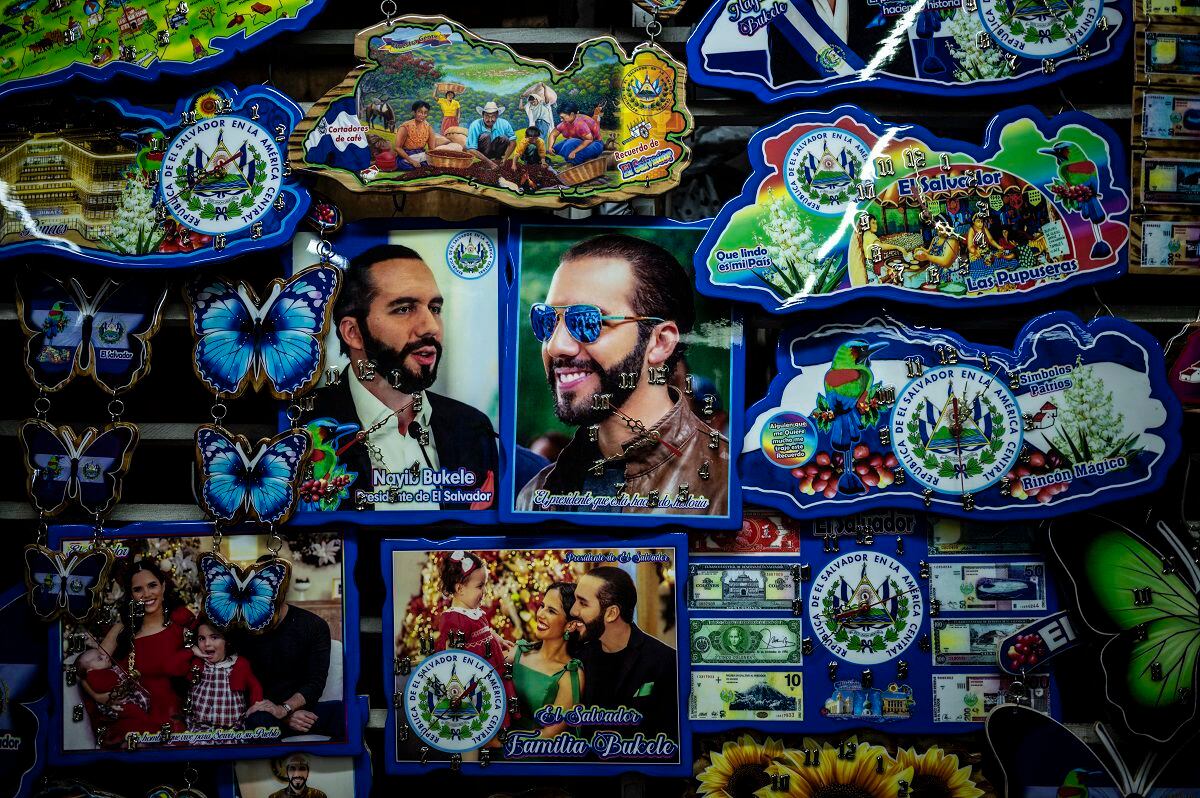 Items with the face of the president of El Salvador, Nayib Bukele, are sold in a market in San Salvador, on January 30, 2024. (Photo by Yuri CORTEZ / AFP)