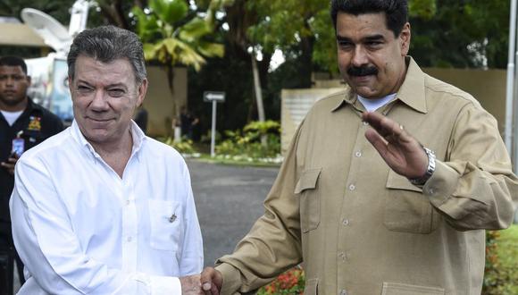 El presidente colombiano Juan Manuel Santos junto al mandatario venezolano Nicolás Maduro en una reunión en la región venezolana de Puerto Ordaz en 2011. (Foto: Reuters)