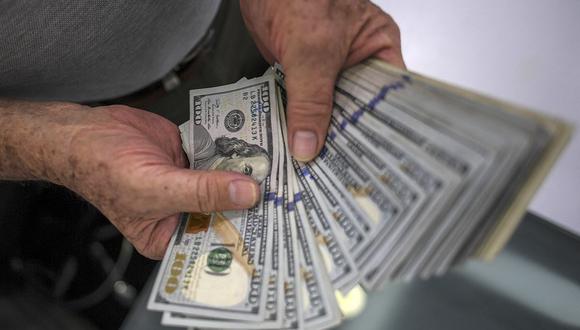 El dólar se negociaba a 4,74 bolívares en Venezuela este viernes. (Foto: AFP)