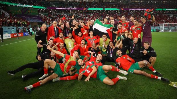 The Moroccan teams celebrated with the Palestinian flag after beating Spain on penalties.