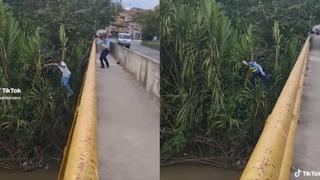 La verdad del video de hombre que se lanza a río para evitar un comparendo