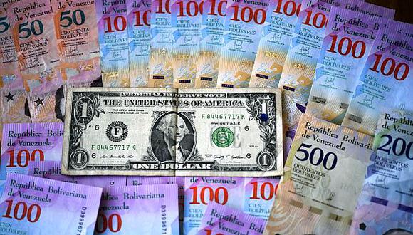 El dólar se cotizaba a&nbsp;3,120.46 bolívares soberanos en la jornada previa. (Foto: AFP)