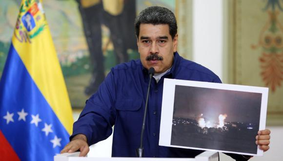 "Tenemos la victoria en nuestras manos, en la reposición del sistema eléctrico, ahora nos toca consolidar la victoria de la guerra eléctrica", dijo Nicolás Maduro, sin descartar nuevos "sabotajes". (Foto: AFP)