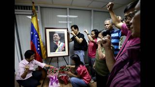 FOTOS: la muerte de Hugo Chávez también se siente en Filipinas, Palestina y Bielorrusia