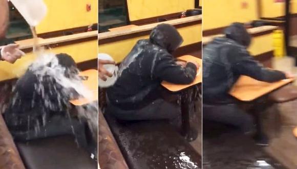 Dunkin' Donuts despide a empleado que lanzó agua a joven sin hogar. (Captura)