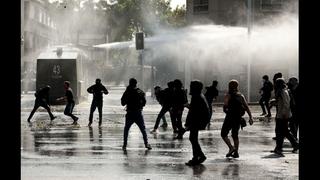 Chile: Encapuchados desatan violencia en marcha de estudiantes
