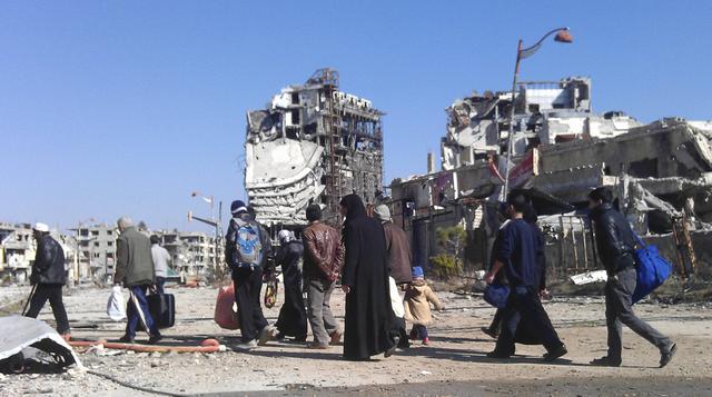 Siria: Los civiles huyen del hambre y las bombas en Homs - 1