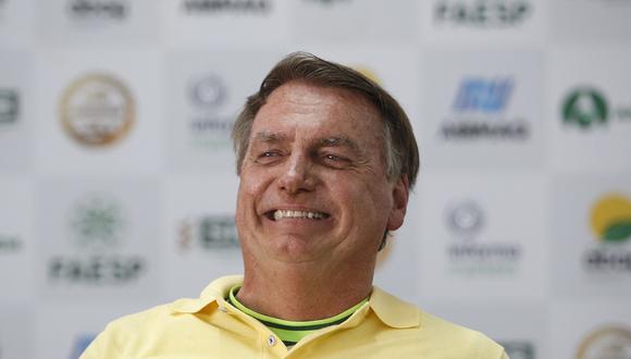 El expresidente brasileño Jair Bolsonaro sonríe durante la ceremonia de apertura de la feria Agrishow en Ribeirao Preto, Sao Paulo, Brasil, el 1 de mayo de 2023. (Foto de Miguel SCHINCARIOL / AFP)