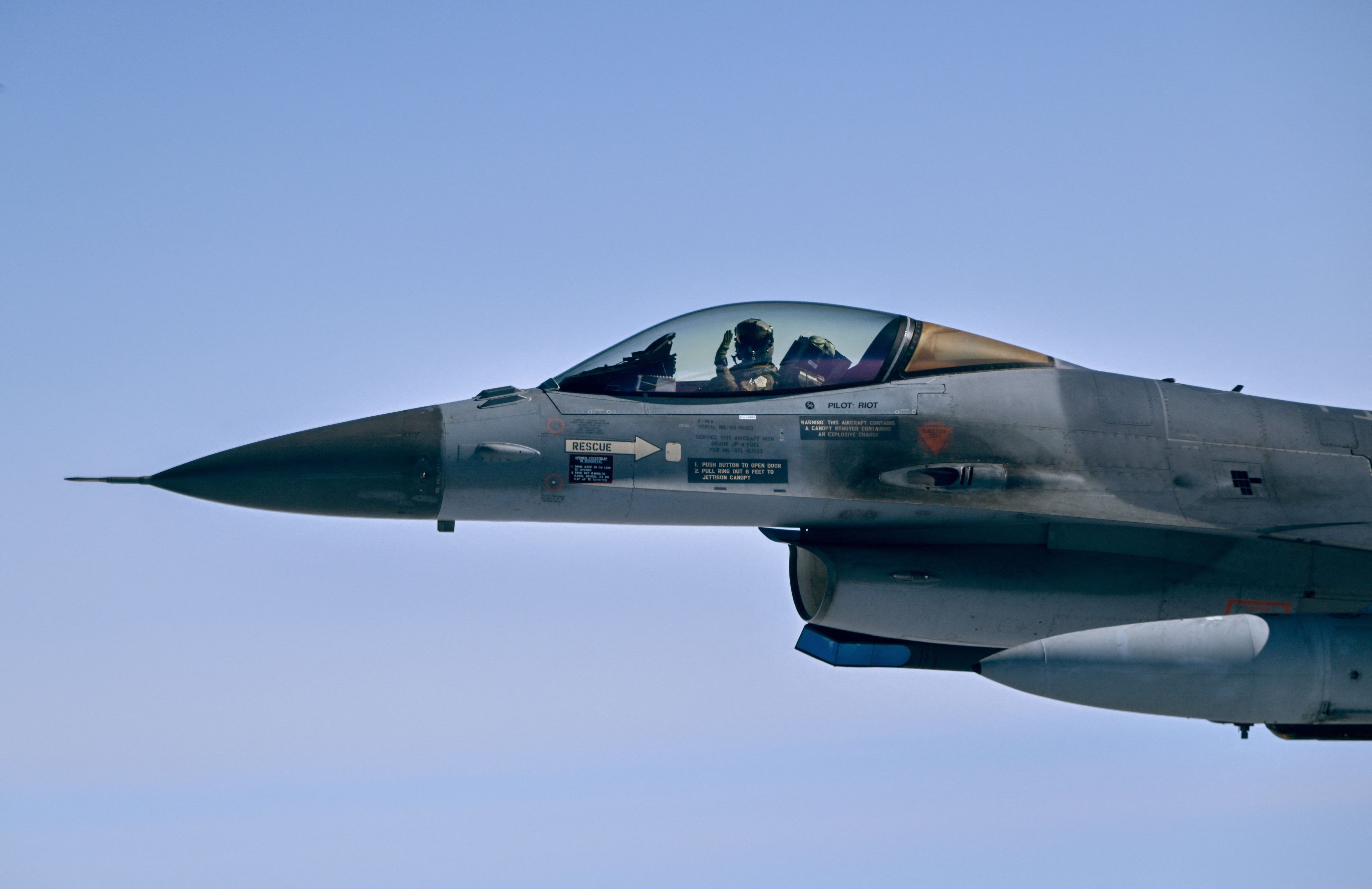 A Netherlands Air Force F-16 fighter jet takes part in a NATO exercise on July 4, 2023. (Photo by John THYS / AFP)