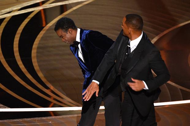 Will Smith (right) slaps American actor Chris Rock on stage during the 94th Academy Awards at the Dolby Theater in Hollywood, California on March 27, 2022. (Photo: Robyn Beck / AFP)