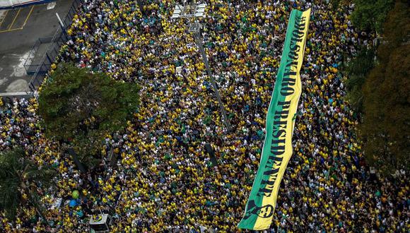 Según las encuestas de intención de voto, Bolsonaro y Haddad se enfrentarían en una segunda vuelta. | Foto: AFP