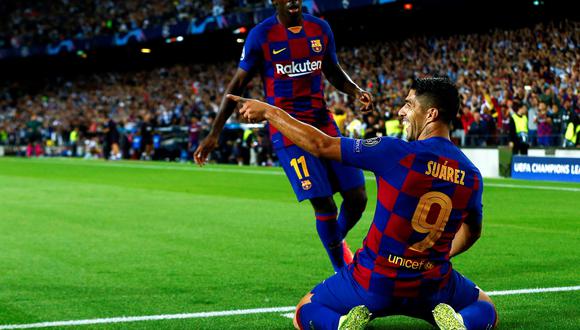 El delantero del Barcelona Luis Suárez (d) celebra tras marcar el segundo gol ante el Inter de Milán, en el duelo de la Champions League disputado en el Camp Nou. (Foto: EFE/Enric Fontcuberta)