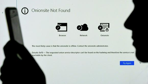 Imagen de archivo | Esta ilustración fotográfica muestra una pantalla que muestra la dirección del sitio Darkside Onionsite con un aviso que dice que no se pudo encontrar, en Arlington, Virginia, el 14 de mayo de 2021. (Foto de OLIVIER DOULIERY / AFP)