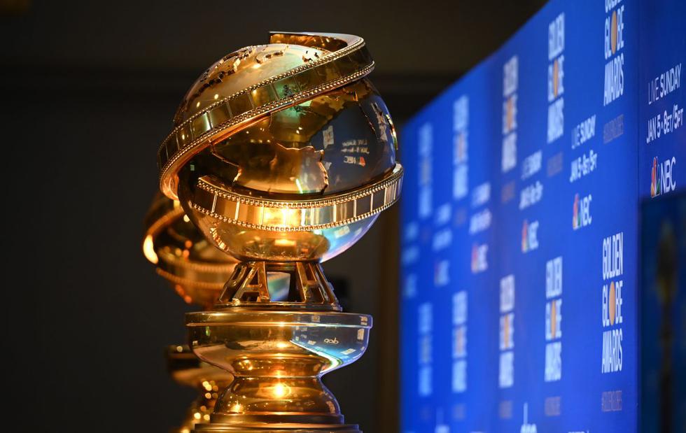 (FILES) In this file photo taken on December 9, 2019 Golden Globe trophies are set by the stage ahead of the 77th Annual Golden Globe Awards nominations announcement at the Beverly Hilton hotel in Beverly Hills. - Hollywood's biggest party, the Golden Globes, kicks off the showbiz awards season Sunday, with streaming giant Netflix expected to be popping champagne corks through the night. (Photo by Robyn BECK / AFP)