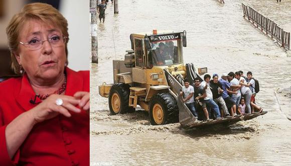 Michelle Bachelet, presidenta de Chile, y damnificados en Huachipa, Lima. (AFP / Juan Ponce)