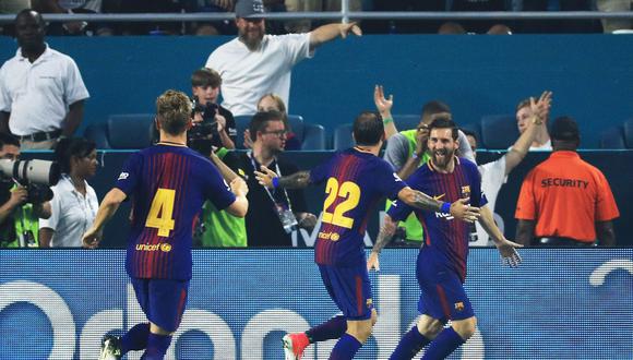 Messi y la celebración tras abrir el marcador del clásico con un golazo. Foto: agencias