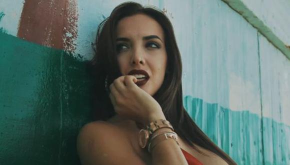 Rosángela Espinoza baila bachata en videoclip del Grupo Extra