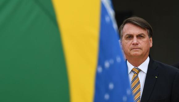 Un día después de la muerte de Joao Alberto Silveira Freitas en su supermercado de Porto Alegre a manos de personal de seguridad,Jair Bolsonaro abordó el tema del racismo en la cumbre virtual del G20. (Foto: EVARISTO SA / AFP).